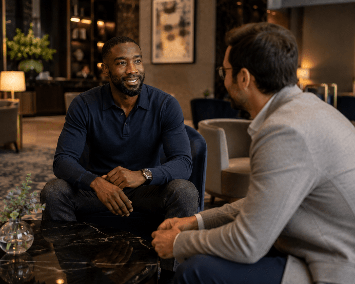 Alex in a boutique hotel lobby, the type of property Signal builds services for